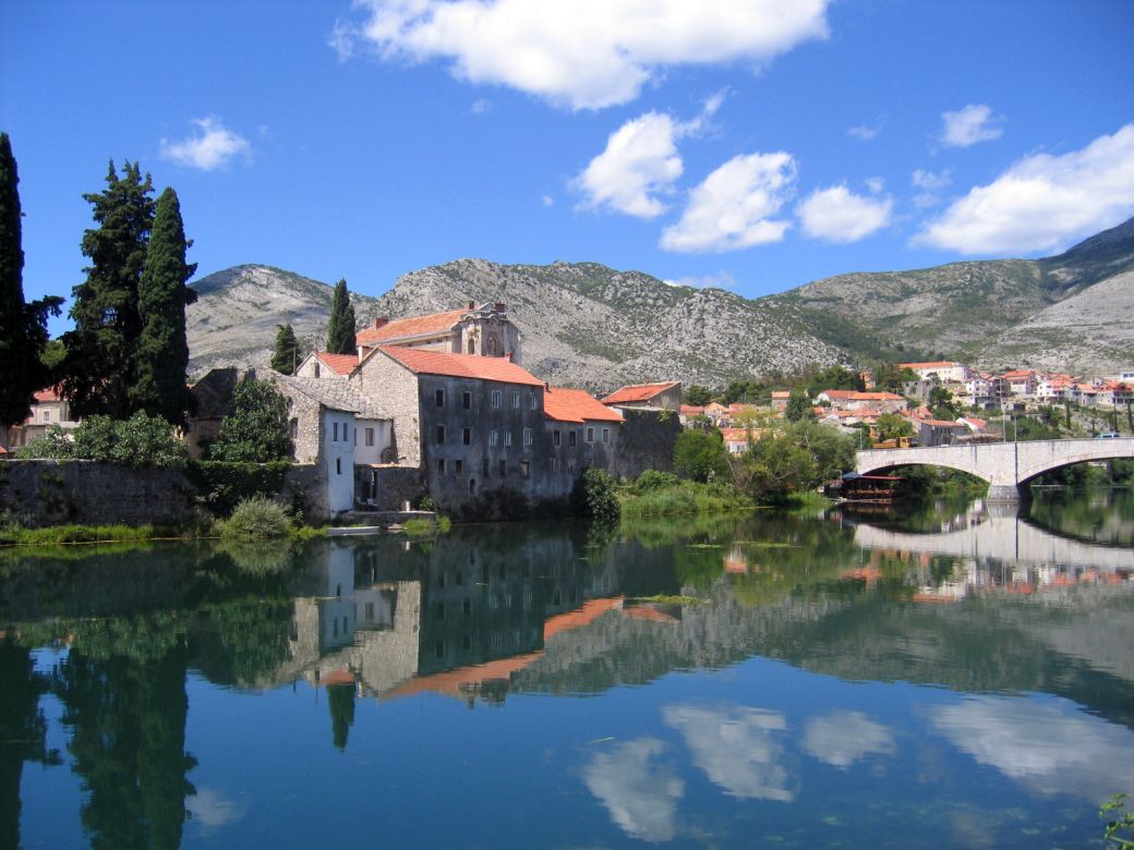 Trebinje, Bosnia and Herzegovina - Day trip from Tivat to Vjetrenica cave with wine tasting in Tvrdos monastery. Private car tour by Monterrasol Travel.